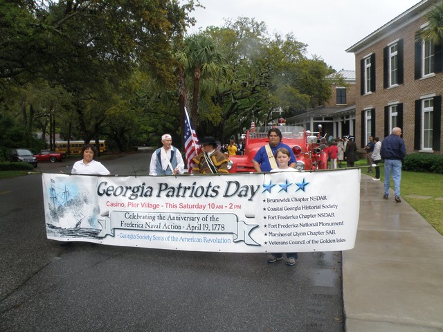 Banner carried by St.Simons Elementery Students.JPG